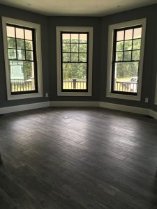 radiant floor with 3 large windows